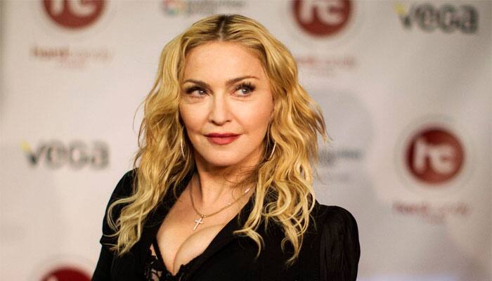 Madonna accused of using Hebdo&#039;s name to promote album