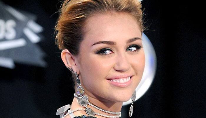 Miley Cyrus&#039; latest look pays tribute to Elvis Presley