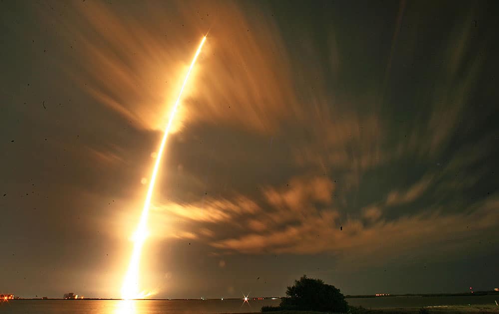 A SpaceX Falcon 9 steaks off from launchPad 40, at Cape Canaveral Air Force Station, in Cape Caveral Florida. The Falcon 9 rocket launched the Dragon spacecraft to deliver supplies to the International Space Station. 