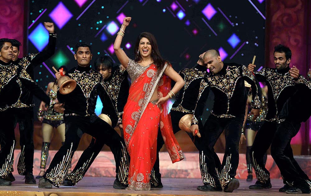 Bollywood actress Priyanka Chopra performs during the Umang Mumbai Police Show 2015 in Mumbai.