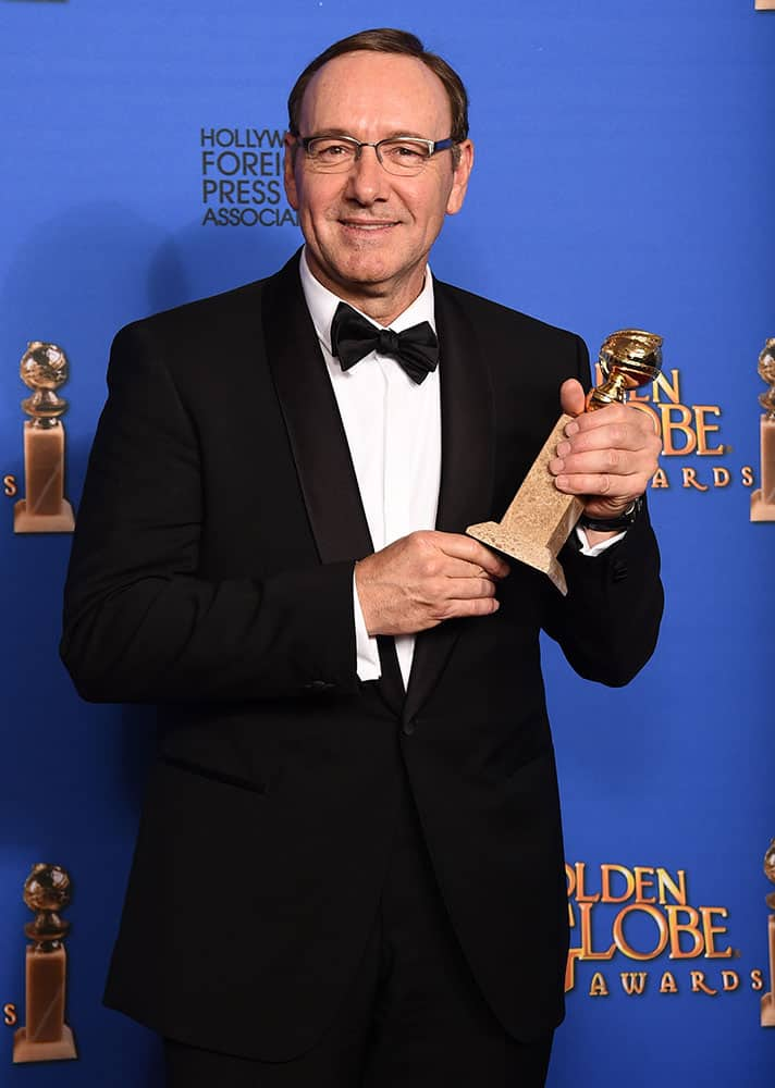 Kevin Spacey poses in the press room with the award for best actor in a television series - drama for 