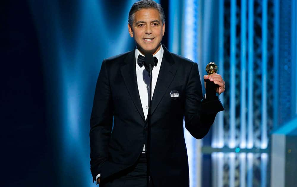 George Clooney accepts the Cecil B. DeMille Award at the 72nd Annual Golden Globe Awards.