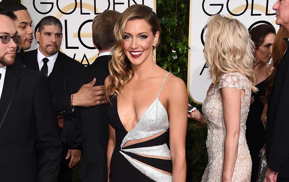 Katie Cassidy arrives at the 72nd annual Golden Globe Awards at the Beverly Hilton Hotel