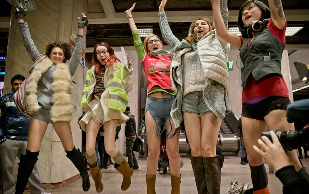 Women jump for a photograph as they take part in the first edition of the No Pants Subway Ride in Bucharest, Romania.  The No Pants Subway Ride began in 2002 in New York as a stunt and has taken place in cities around the world since then. 