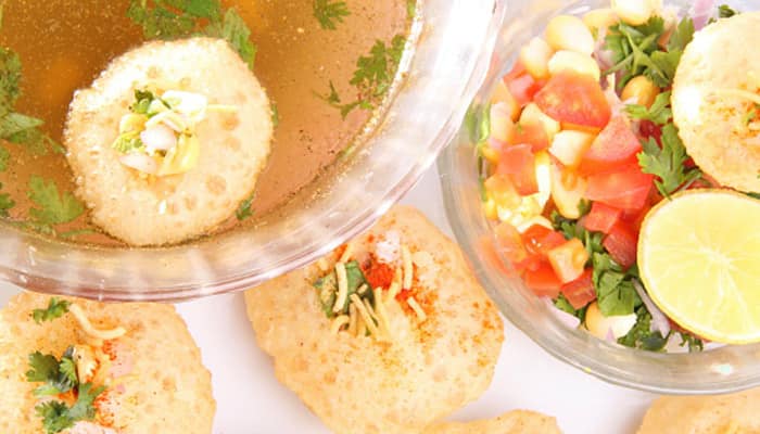 Puri’s stuffed with boiled white peas are dipped in tangy flavoured water and served. You may ask for a potato stuffing too!
(Pic courtesy: Thinkstock Photos)