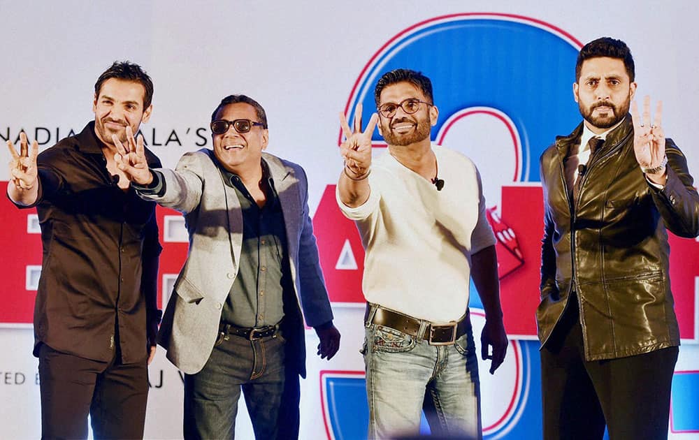 Bollywood actors John Abraham, Paresh Rawal, Suniel Shetty and Abhishek Bachchan during the Muhurat (auspicious time) shot of Hera Pheri 3 in Mumbai.