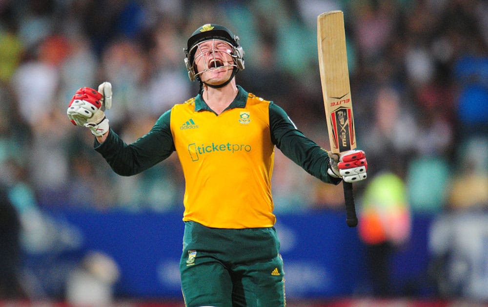 South Africa's Morne van Wyk celebrates his century during a T20 cricket match against West Indies in Durban, South Africa.