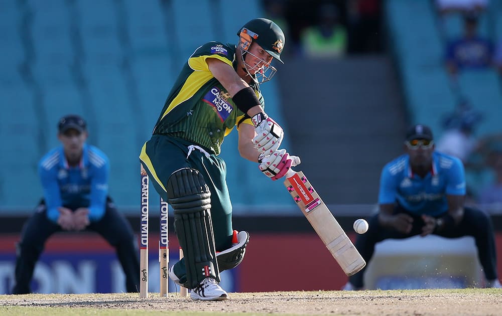 Australia's David Warner plays a shot against England during their One Day International cricket match in Sydney.