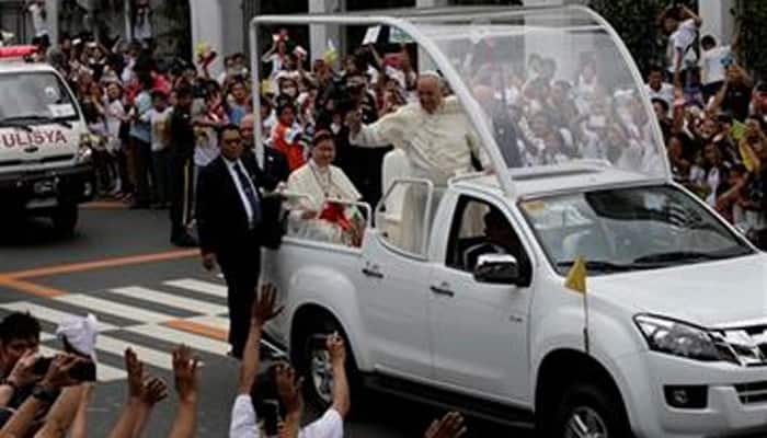 Pope says Philippine typhoon tragedy `silenced` his heart