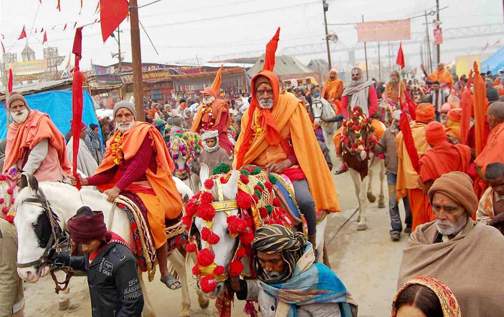 Akhara Sadhus take part in a procession during the month long Magh Mela festival at Sangam, in Allahabad.