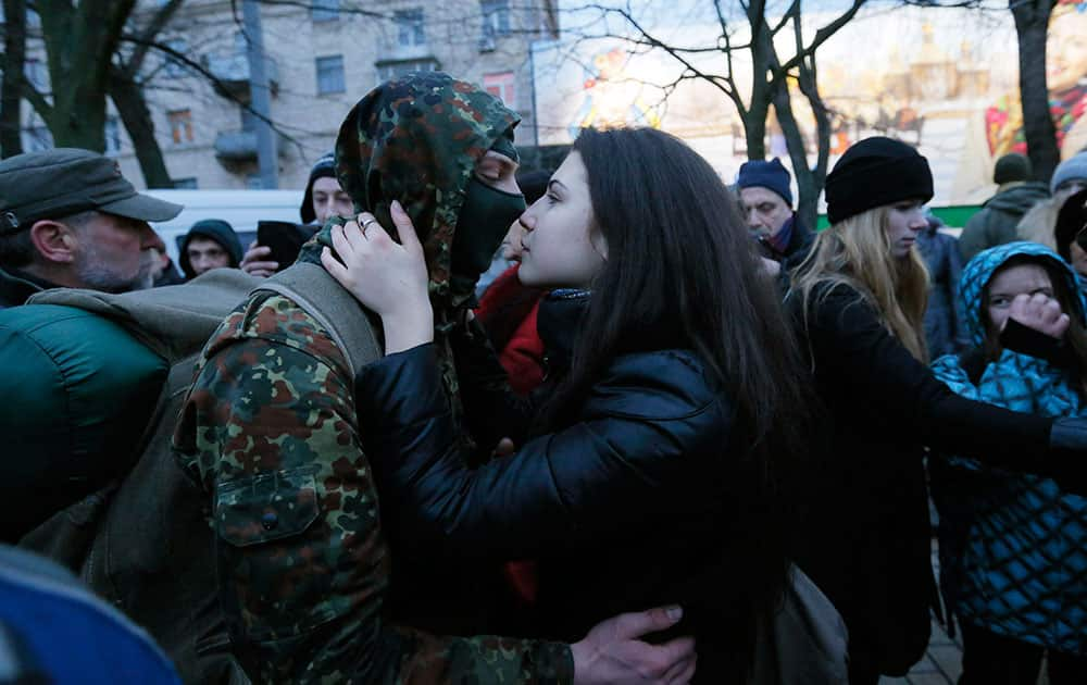 Friends and relatives say goodbye to volunteers being sent to the eastern part of Ukraine to join the ranks of special battalion 