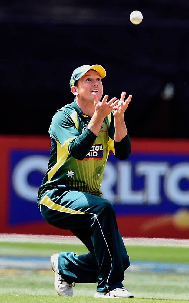 Australia'a George Bailey catches out India's Virat Kohli during their one-day international cricket match in Melbourne.