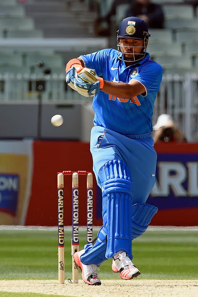 India's Suresh Raina hits a pull shot against Australia during their One Day International cricket match in Melbourne.