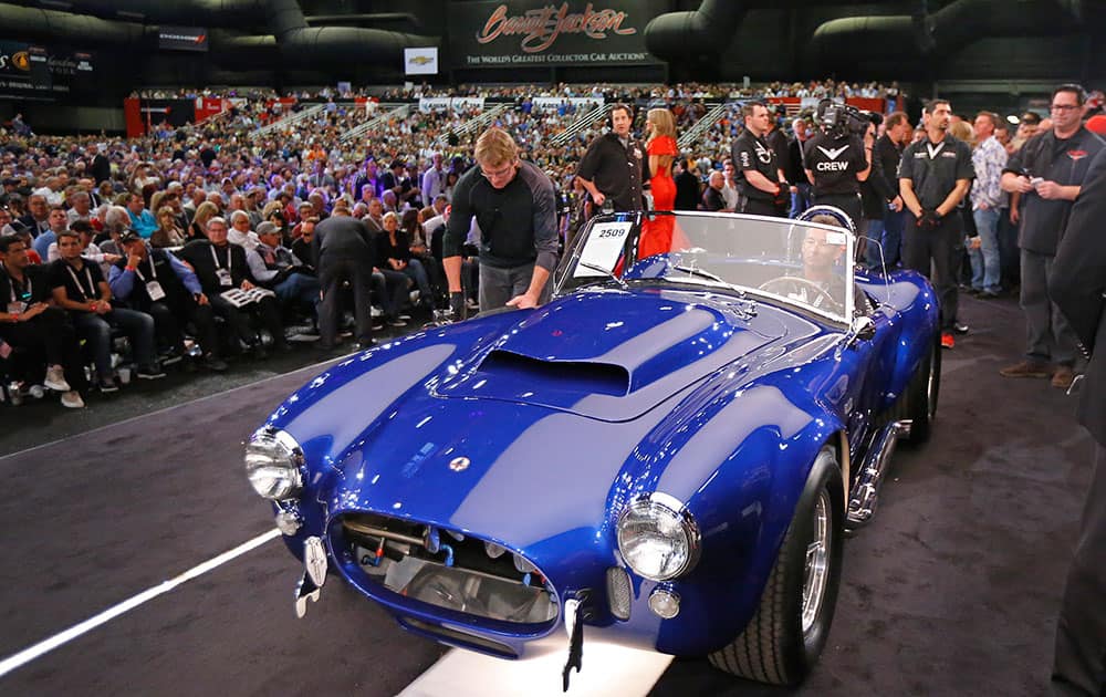 The Shelby Cobra 427 Super Snake sells for $4,700,000 at the Barrett-Jackson auction in Scottsdale, Ariz.