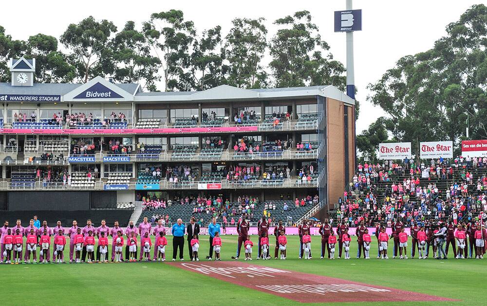 South Africa and the West Indies cricket team players sing their national anthems during the second ODI in Johannesburg, South Africa, Sunday, Jan 18, 2015.