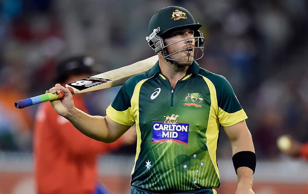 Australia's Aaron Finch walks off the field after going out for 96 runs against India during their One Day International cricket match in Melbourne, Australia, Sunday.