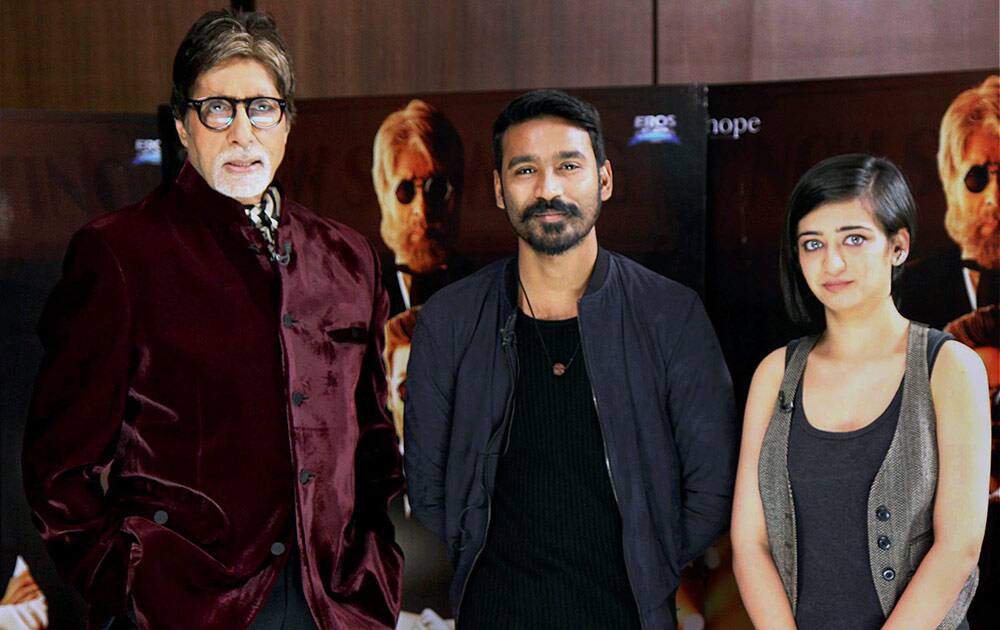 Bollywood actor Amitabh Bachchan, Tamil actor Dhanush and Kamal Haasans younger daughter Akshara Haasan during a promotional event of their upcoming film, Shamitabh in Mumbai.