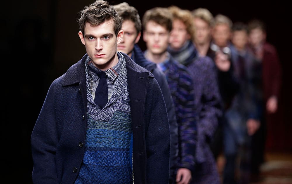 Models wear creations for Missoni men's Fall - Winter 2015-2016 collection, part of the Milan Fashion Week.