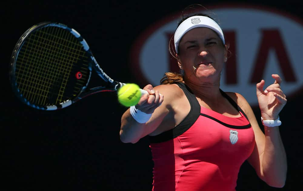 Alexandra Dulgheru of Romania makes a forehand return to Jarmila Gajdosova of Australia during their first round match at the Australian Open tennis championship in Melbourne.