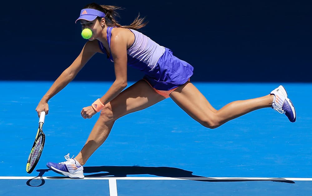 Ana Ivanovic of Serbia chases down a shot to Lucie Hradecka of the Czech Republic during their first round match at the Australian Open tennis championship in Melbourne.