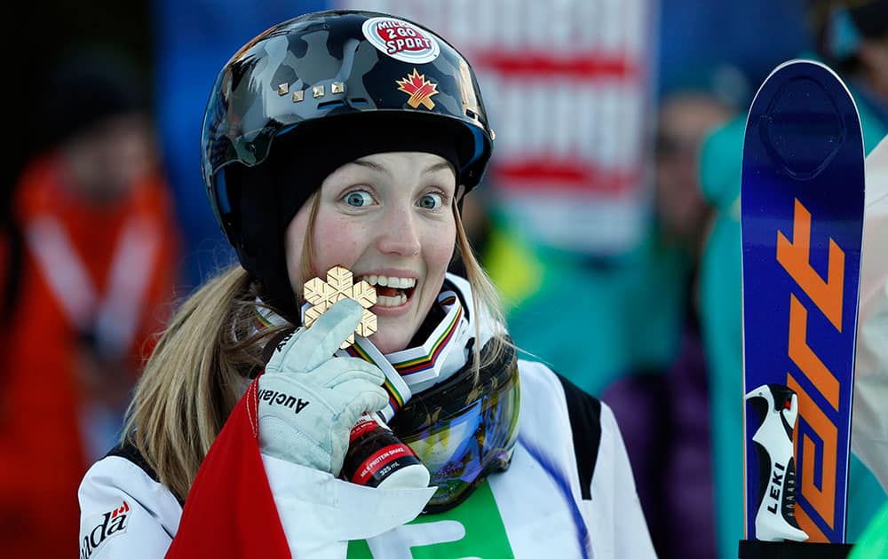 Canada's Justine Dofour-Lapionte celebrates her victory in the women's freestyle skiing single moguls final event at the Freestyle Ski and Snowboard World Championships in Kreischberg, Austria.