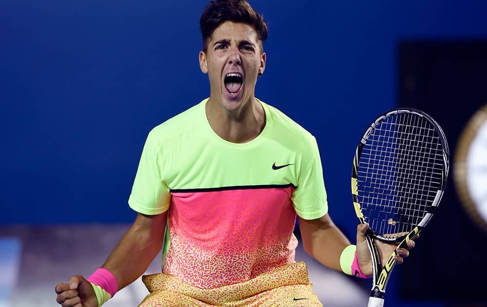 Thanasi Kokkinakis of Australia celebrates after beating Ernests Gulbis of Latvia during their first round match at the Australian Open tennis championship in Melbourne.