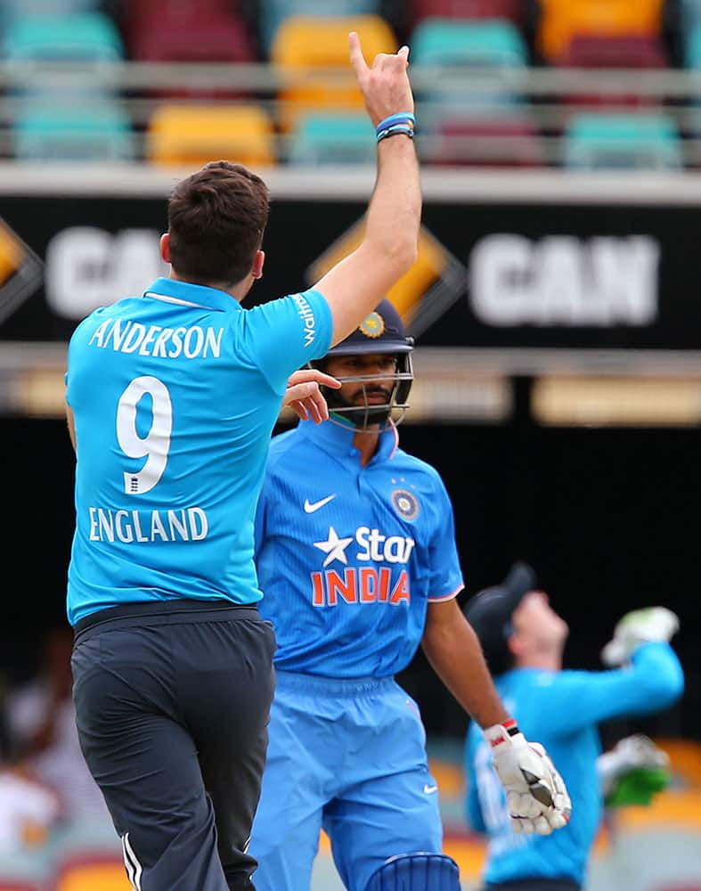 England's bowler James Anderson celebrates after taking the wicket of India's Shikhar Dhawan caught behind for 1 run during their one day International cricket match in Brisbane.