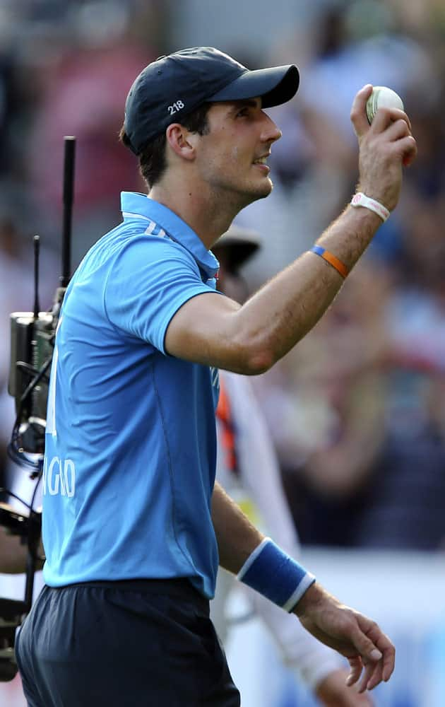 England's Steven Finn waves to the crowd after he took five wickets during the one-day International cricket match between England and India in Brisbane.