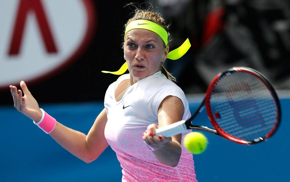 Petra Kvitova of the Czech Republic makes forehand return during her first round match against Richel Hogenkamp of the Netherlands at the Australian Open tennis championship in Melbourne, Australia.