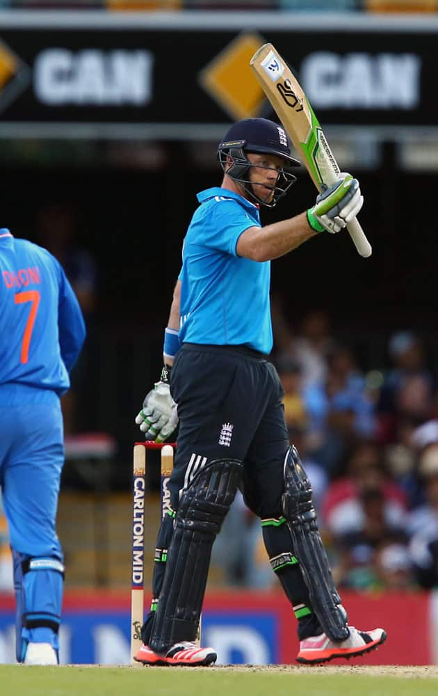 England's Ian Bell waves to the crowd after reaching 50 runs during the one day International cricket match between England and India in Brisbane, Australia.