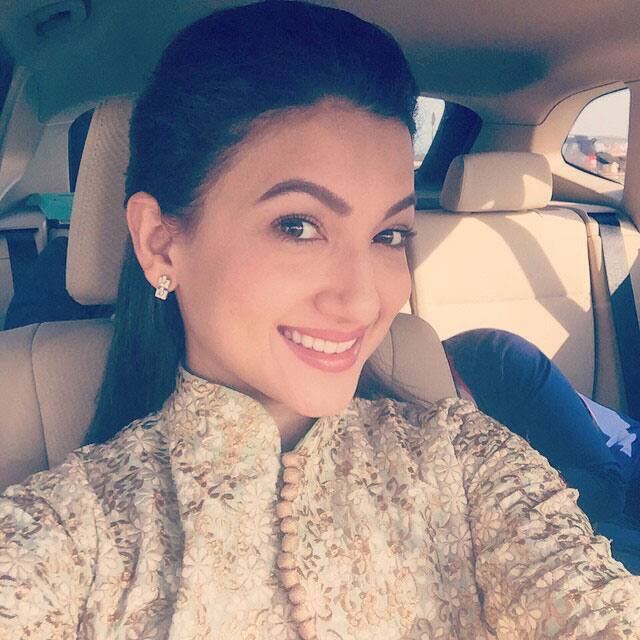 GAUAHAR khan -: My sweet friends sonam n paras modi launching their line at hue ..off to Gv my best wishes fr @sva_couture.. My #staff hiding in d car... #selfie #guilty -instagram
