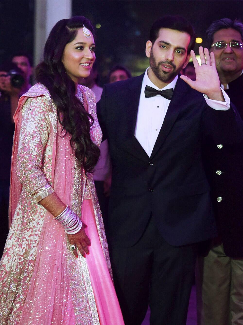 Shatrughan Sinhas son Kussh and Taruna Agarwal during their wedding reception in Mumbai.