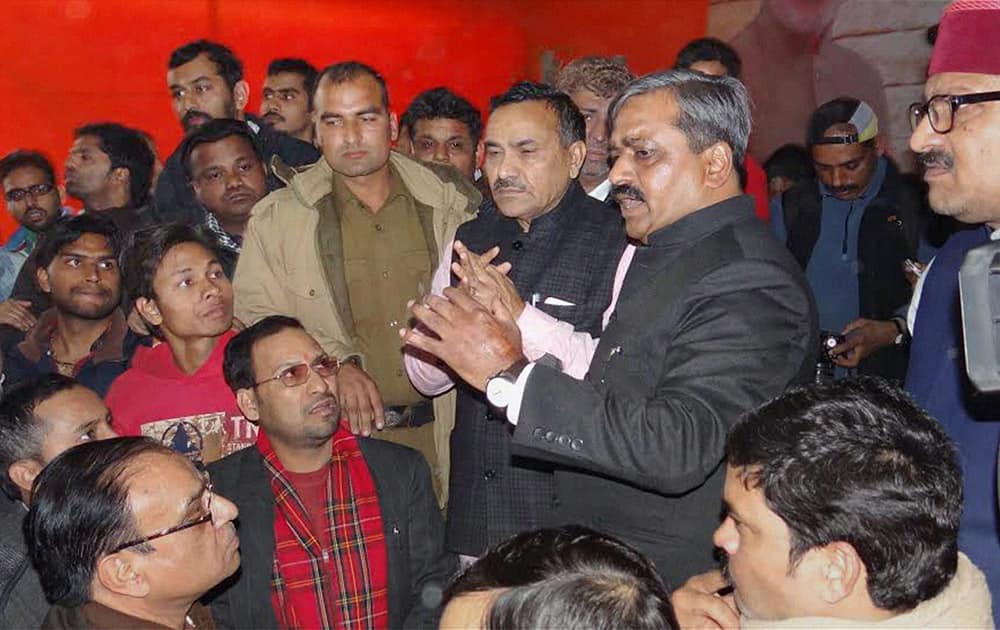 Delhi BJP President Satish Upadhyay talking to his supporters protesting at Delhi BJP office in new Delhi.