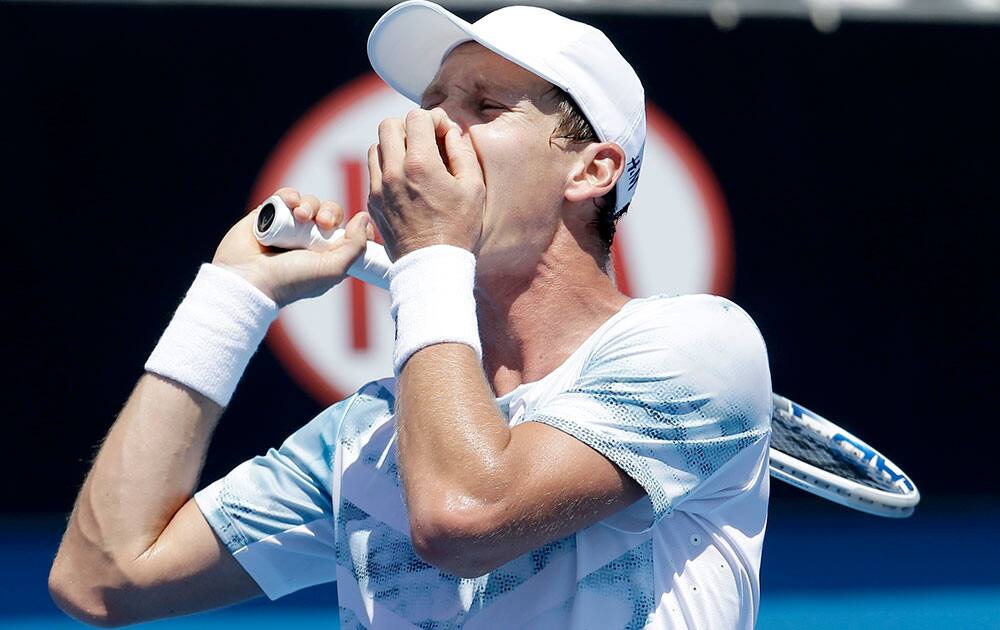 Tomas Berdych of the Czech Republic reacts to a lost point to Jurgen Melzer of Austria during their second round match at the Australian Open tennis championship in Melbourne.