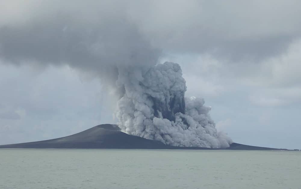 This photo released by New Zealand's Ministry of Foreign Affairs and Trade, a volcano erupts near Tonga in the South Pacific Ocean. 