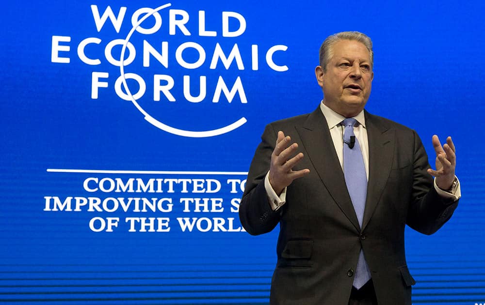 Former US Vice President Al Gore gestures as he speaks during a panel 'What's Next? A Climate for Action', during the World Economic Forum in Davos, Switzerland.