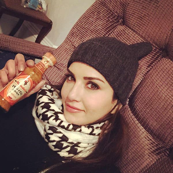 Sunny Leone :- Freezing cold outside but I'm nice and cozy and I found nandos peri peri sauce for my brother @chefsundeep -twitter