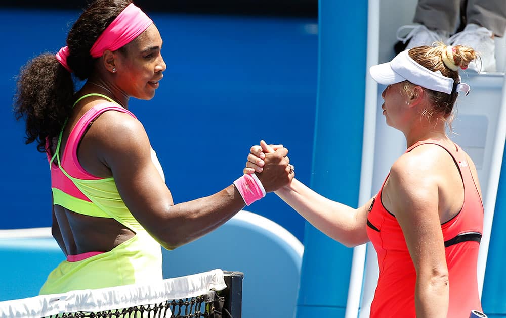 Serena Williams of the US. shakes hands with Vera Zvonareva of Russia after winning their second round match at the Australian Open tennis championship.