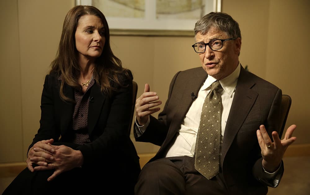 Melinda Gates listens while her husband Bill Gates talks during an interview in New York. As the world decides on the most crucial goals for the next 15 years in defeating poverty, disease and hunger, the $42 billion Gates Foundation announces its own ambitious agenda. 