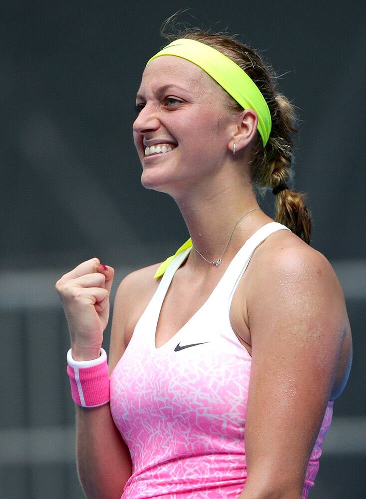 Petra Kvitova of the Czech Republic celebrates after defeating Mona Barthel of Germany during their second round match at the Australian Open tennis championship in Melbourne, Australia.