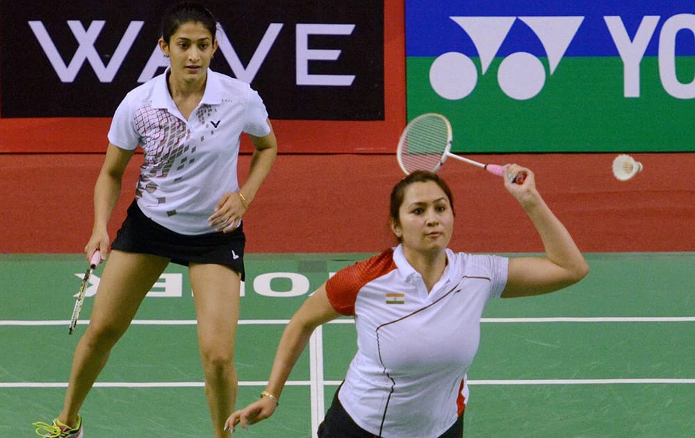 Jwala Gutta and Ashwani Ponnappa in action during a match at Syed Modi International Badmintion Championship in Lucknow.