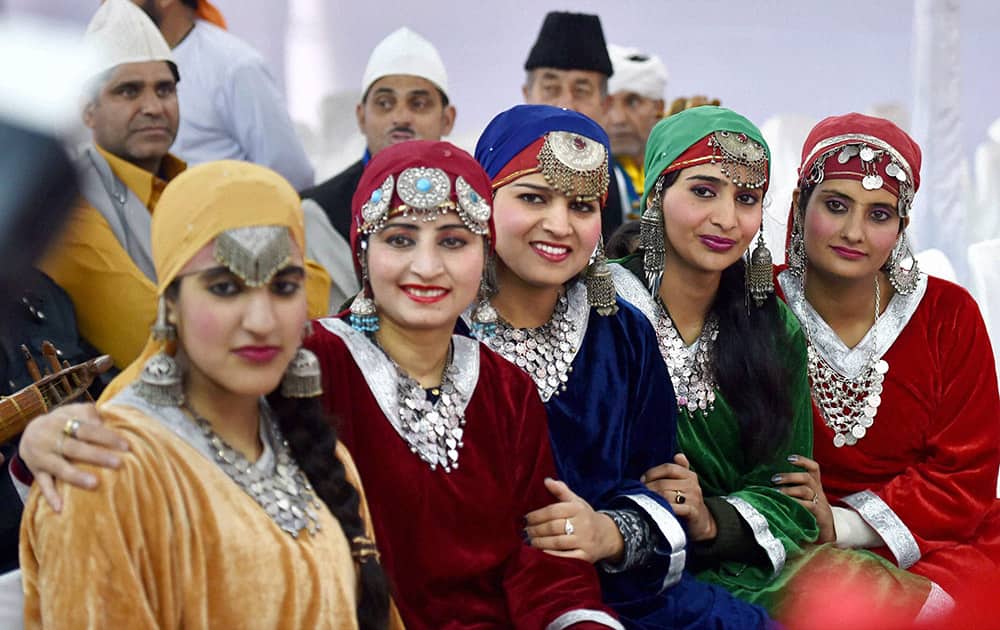 Artists of Jammu Kashmir tableaux, participating in Republic Day parade, pose for a photo during a press preview in New Delhi.