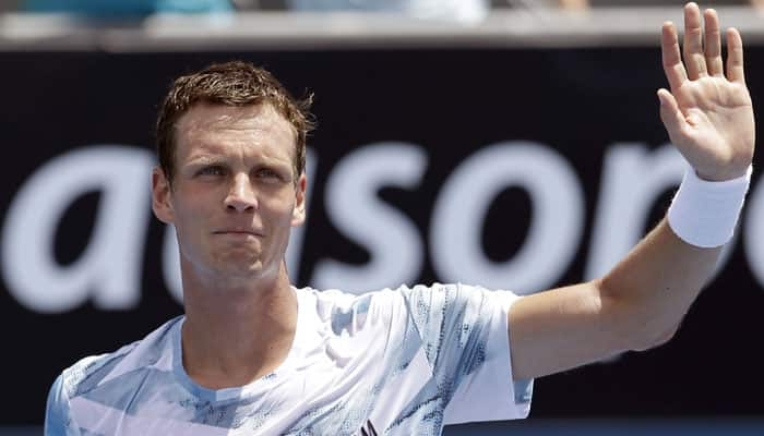 Tomas Berdych powers into Open fourth round