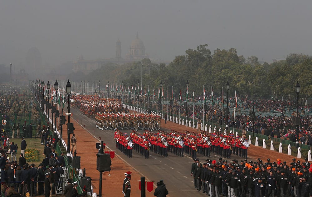 Soldiers march down Rajpath, a ceremonial boulevard that runs from Indian President's palace to war memorial India Gate, during a full dress rehearsal ahead of Republic Day parade in New Delhi.