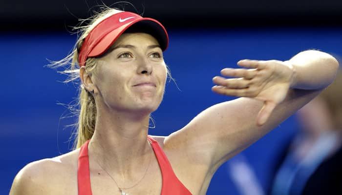 Maria Sharapova returns to form to reach fourth round