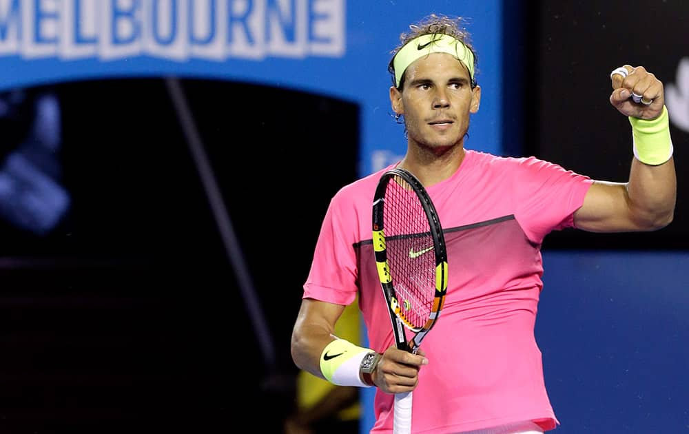 Rafael Nadal of Spain celebrates after defeating Dudi Sela of Israel during their third round match at the Australian Open tennis championship in Melbourne, Australia.