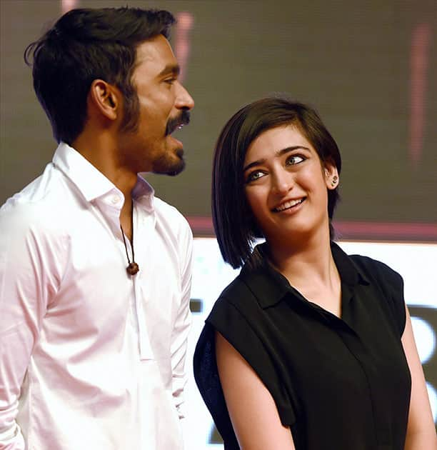 Actor Dhanush and Kamal Haasans younger daughter Akshara Haasan during a promotional event of their upcoming film SHAMITABH at a private college in Chennai.