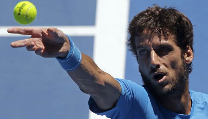 Australian Open: Feliciano Lopez apologises to injured ball-boy for low blow 