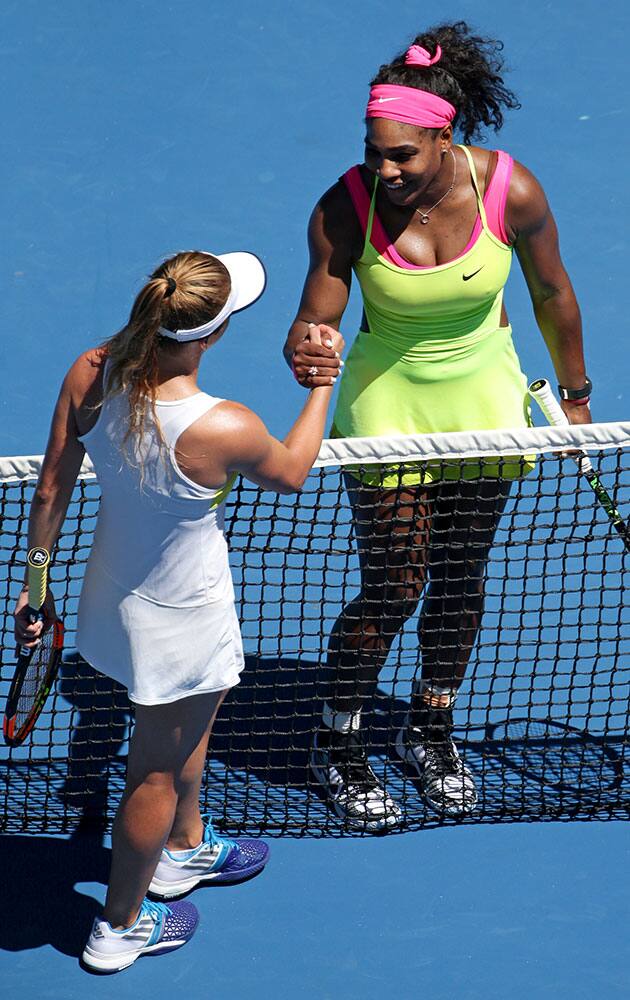 Serena Williams of the U.S., right, shakes hands with Elina Svitolina of Ukraine after winning their third round match at the Australian Open tennis championship in Melbourne, Australia.