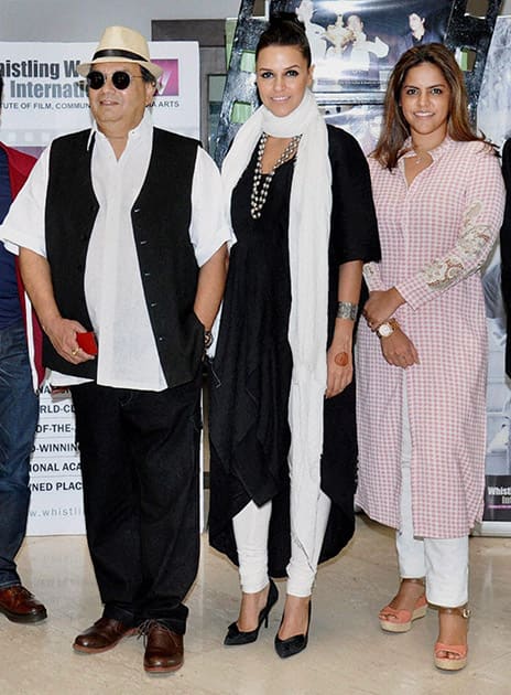 Bollywood director Subhash Ghai, Neha Dhupia and daughter Meghna Ghai during the Future of Fashion Forum hosted by Whistling Woods Neeta Lulla School of Fashion.